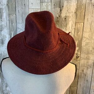 Adorable flexible maroon sun hat.